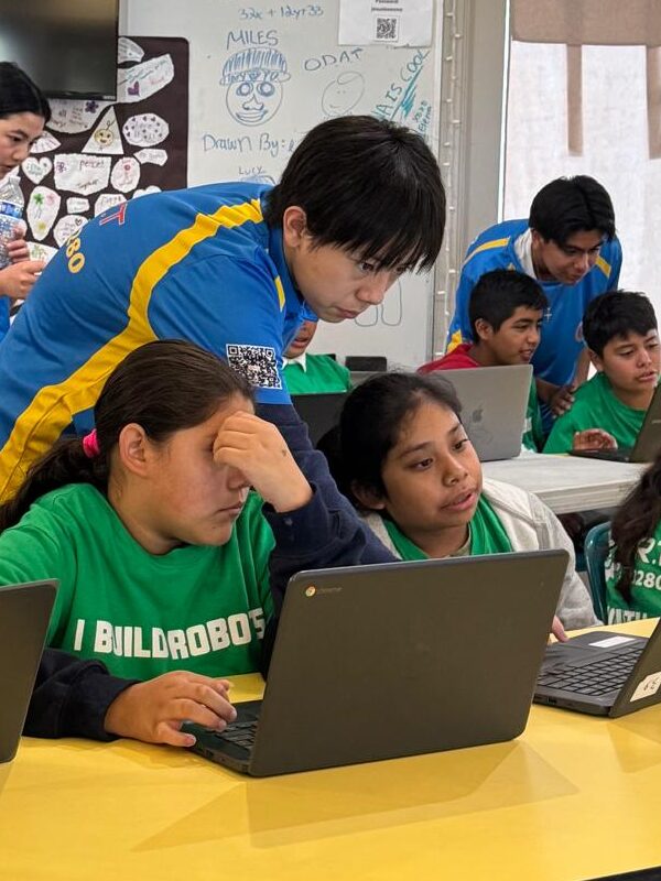 Bridging Cultures and Inspiring Futures – Alex Tang’s Coding Outreach at Casa de Amistad